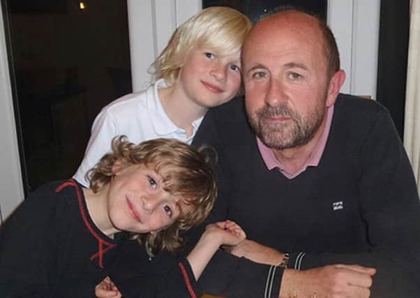Paul Cliffe and boys Hugo and Toby, who along with mum Carol, are taking part in a national challenge to reduce their sugar intake.