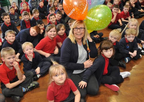 Rift House Primary School site supervisor Karen Malone is celebrating 30 years at the school.