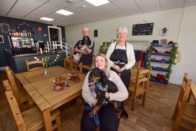 Pictured in the new Doggie Diner cafe in Middle Street, Blackhall are (front) Kirsty McInnes with Pippin and David (with Buster) and Sue Nelson.