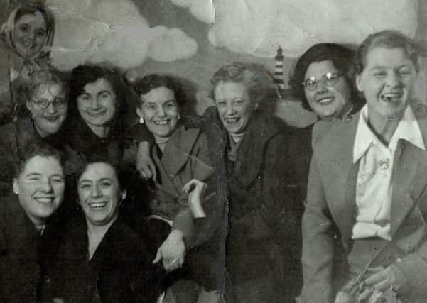 The photograph showing  Emma Herring, front right. Can you help identify others in the shot?