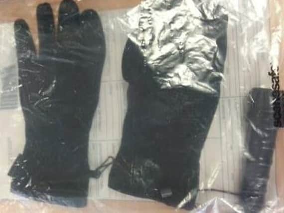 Gloves are among the items found by police.