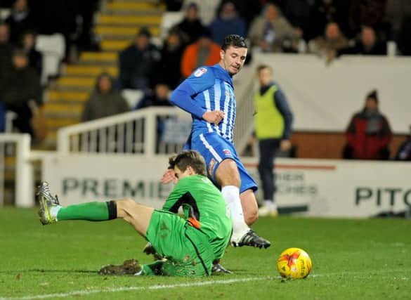 Padraig Amond beats the Crewe keeper to score Pools' second goal. Picture by FRANK REID
