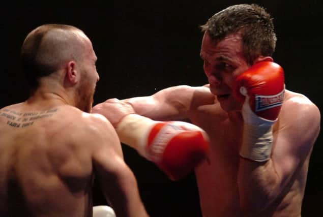 Martin Ward(right) in action against Gutmans.