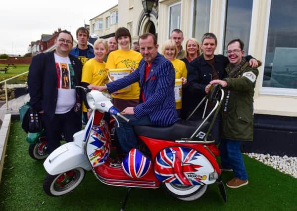 March of the Mods charity event at the Staincliffe Hotel, Seaton Carew, on Saturday with organiser Kev McGuire (second right) and guest Quadrophenia star Gary Shail seated on scooter.