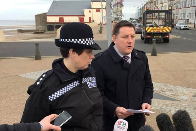Detective Chief Inspector Steve Young and Chief Inspector Emily Harrison speak to the media on Redcar promenade where a woman and her child were snatched on Friday. Photo by Press Association.