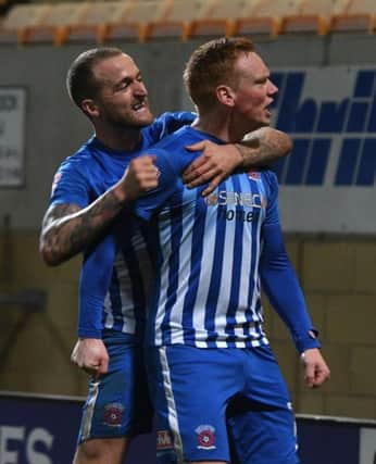 Michael Woods celebrates his goal with Lewis Alessandra