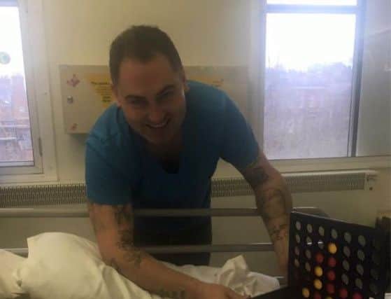 Matt Haycox visits Alfie Smith in hospital.