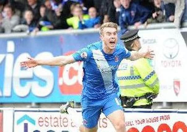 Rhys Oates celebrates in front of the Pools fans at Morecambe in April 2016. Picture by FRANK REID