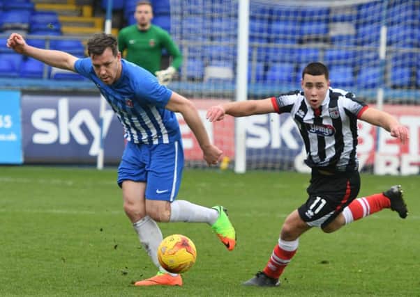 Carl Magnay tidies up for Hartlepool United Reserves in yesterday's clash with Grimsby Town. Picture by Kevin Brady