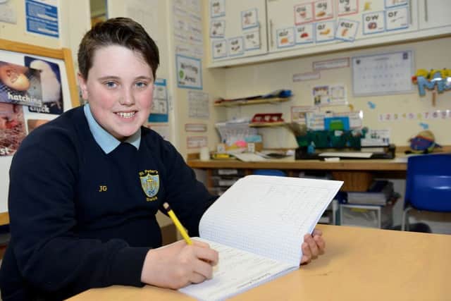 St Peter's Elwick Primary School pupil Joseph Gill doing his English work.