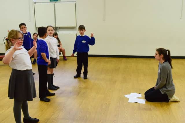 Laura Rea of Play in a Day helping pupils at Barnard Grove Primary School, Hartlepool, with a version of Midsummer Nights Dream as part of Shakespeare Week.