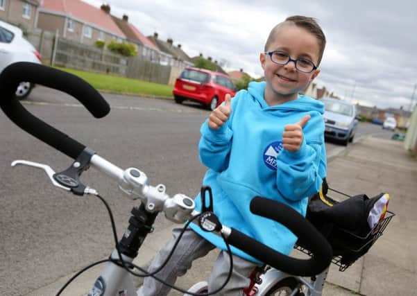 Hartlepool five year old Tyler McGregor has got a new bike to help him get around. Picture: TOM BANKS