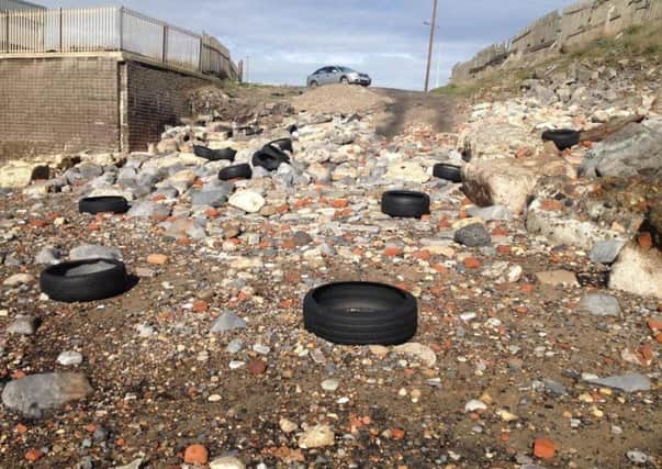 Tyres left on Middleton Beach, which has been listed as a problem hotspot for flytipping.