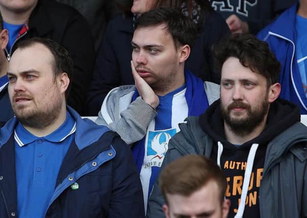 Pools fans show the pain of relegation. Picture by FRANK REID