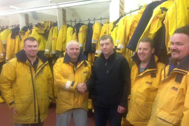 Peterlee Radio Club secretary Owen Smith pictured with Hartlepool RNLI volunteers James Whyte, Andy Booth, Glen Pearson and Matt Blanchard.