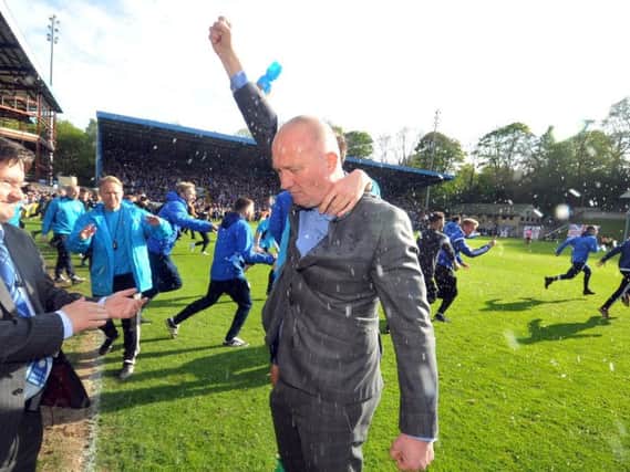 Delighted FC Halifax Town manager Billy Heath celebrates their weekend play-off final victory over Chorley at their MSI Stadium, formerly known as The Shay.