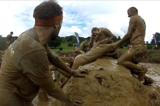 One of the very muddy obstacles on the Tough Mudder course