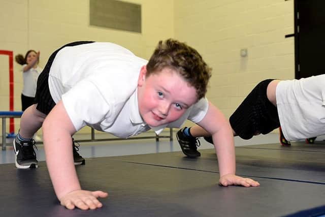 Eskdale Academy pupils are put through their paces by Commonwealth Judo champion Louise Renicks. Picture by FRANK REID
