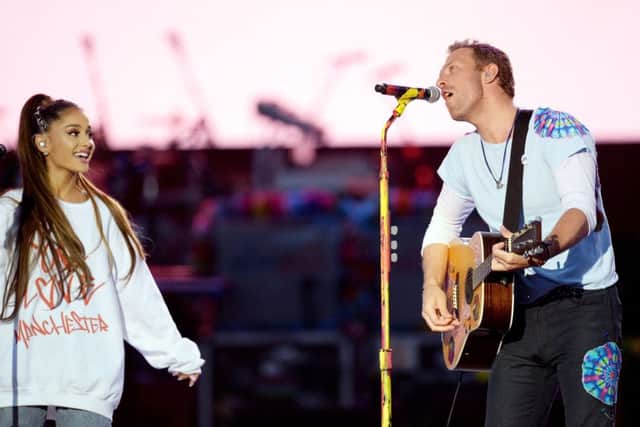 Ariana Grande and Chris Martin performing during the One Love Manchester benefit concert. Photo: Dave Hogan for One Love Manchester/PA Wire