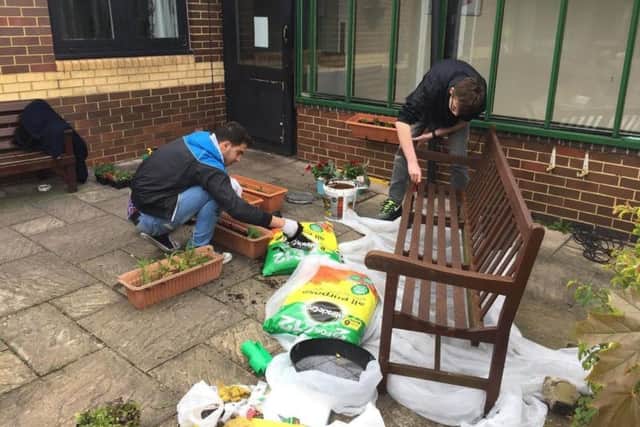 The cadets hard at work at the care home.