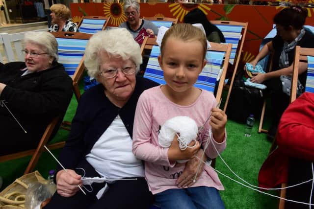 Knitters aged 7 - 85 years old were ut in Middleton Grange Shopping Centre, Hartlepool, on Saturday, doing a sponsired knit in aid of the Blue Light Babies charity. Pictured are 85 year old Beryl Downer and 7 year old Ellie Mai Dignen.