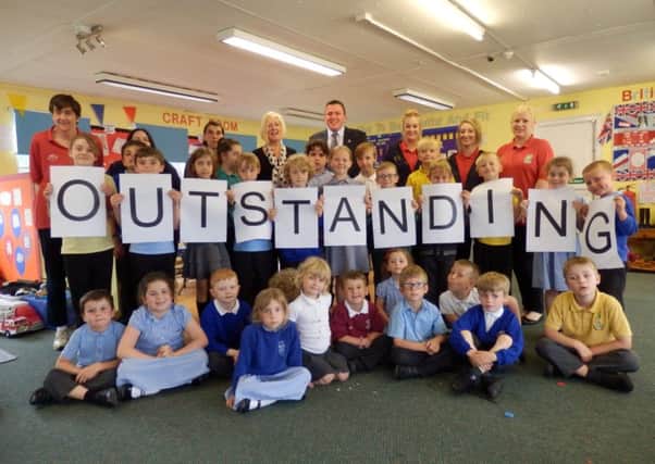 Youngsters celebrate Oscars being rated as 'outstanding' following a recent Ofsted inspection.