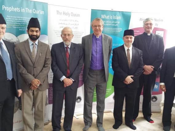 Left, Bilal Atkinson, who is the regional president of Ahmadiyya Muslim Association UK, which runs the Nasir Mosque, at a meeting of religious leaders.