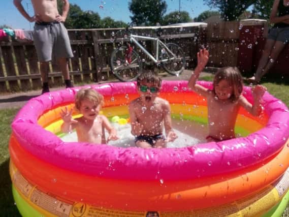 Aimee Jackson sent us this smashing picture of her son Curtis and daughters Yasmin and Lola having a splashing great time.