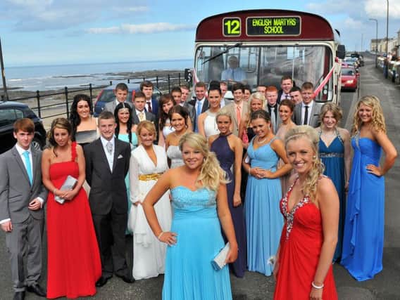 Pupils from English Martyrs School, in Hartlepool, get ready to travel to their 2012 prom in style.