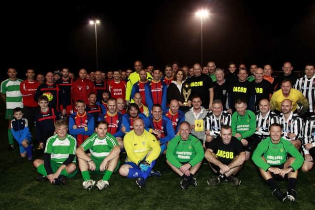 Fundraisers take part in the Jacob Jenkins Memorial Cup last year.
