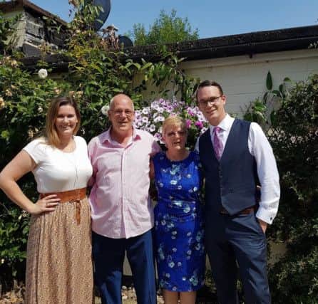 Ian Turnbull with his wife and two grown-up children.