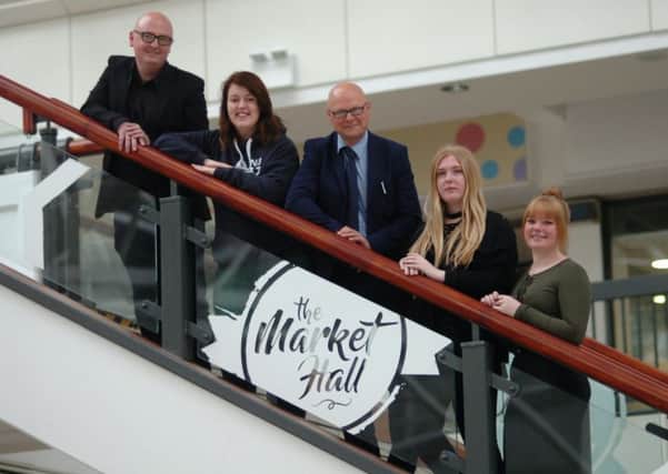 Hartlepool College of Further Education students, from left to right, Ashleigh Humble, Robyn Hart and Danielle O'Neill with Hartlepool College of Further Education Art and Design lecturer Michael Thompson and Middleton Grange Shopping Centre manager Mark Rycraft, centre.