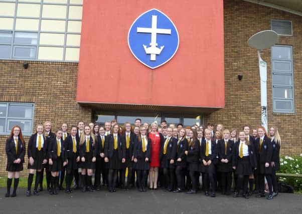 Tracey Gibson, headteacher of St Hilds Church of England School with school prefects.