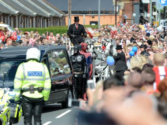 Crowds line the street for Bradley Lowery's funeral.