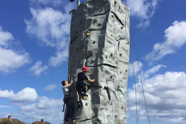 The climbing wall activity at the Rift House Family Fun Day.