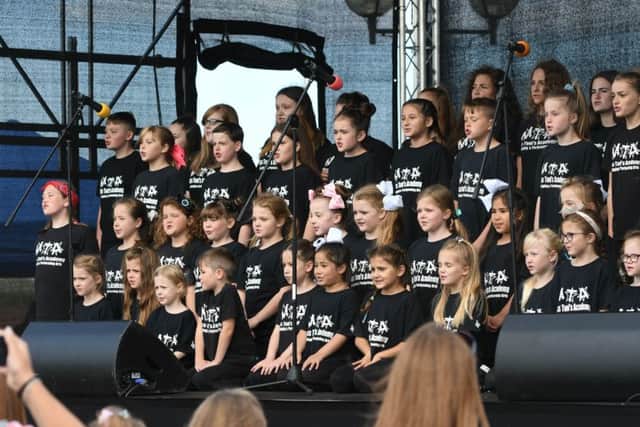 MIss Toni Academy choir perform at the Waterfront Festival.
