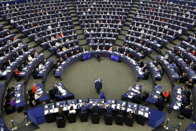 European Commission President Jean-Claude Juncker addresses the members of the European Parliament in Strasbourg (AP Photo/Jean-Francois Badias)