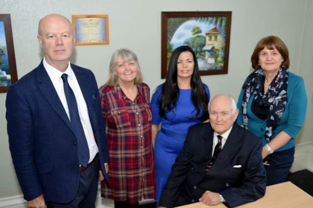 HDVA chairman Paul McCraith (sitting) with (left to right) manager Keith Bayley and staff Liz Ashton, Tracey Wilson, Carole Craggs. Picture by FRANK REID