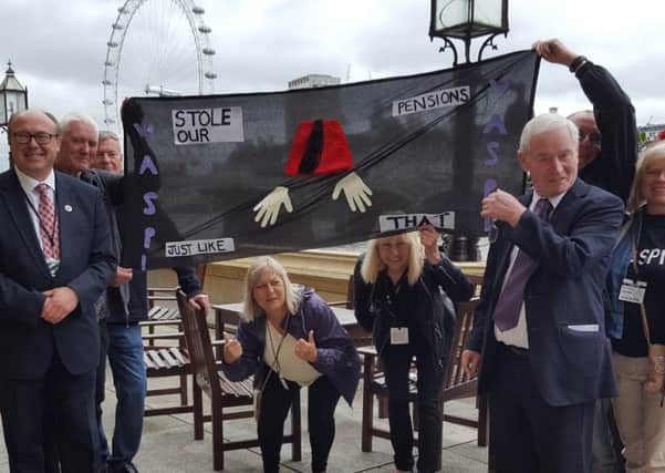 Grahame Morris, left, with fellow Waspi campaigners on the terrace of the Houses of Parliament.