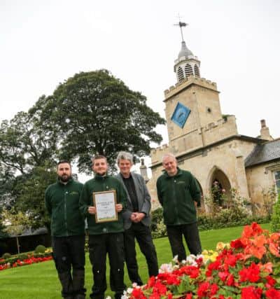 The Hospital of God charity in Greatham has won a gold award in Northumbria In Bloom. Pictured are director David Granath and the gardening team John Turner, Mitchell Ayre and John Churchman with their award. Picture: TOM BANKS