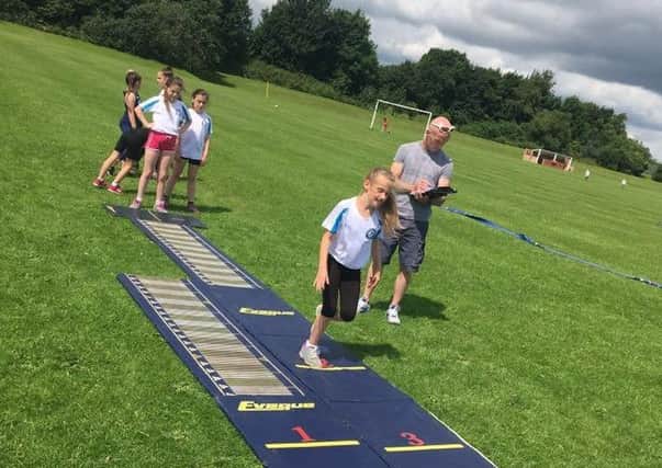 Members of Hartlepool Youth Athletics Club in training