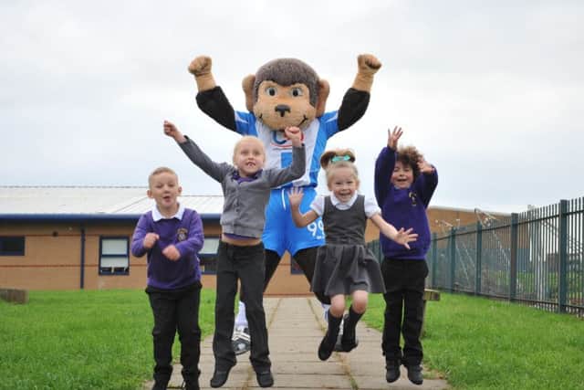 Pupils from Grange Primary School take part in fitness sessions led by Hartlepool Sixth Form students and H'Angus.