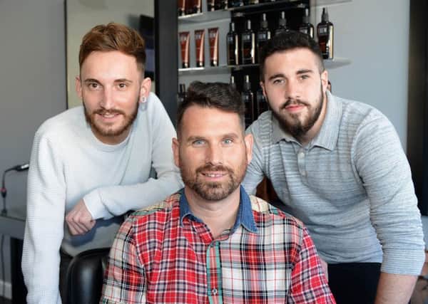 Steve Wearmouth (centre) with apprentice Ben McConnell (left) and Salon Manager Liam Halliwell of Atmensroom. Picture by FRANK REID