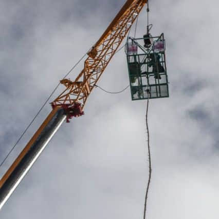 Fundraisers take part in a bungee jump at Hartlepool Marina for Dottie O'Keefe. Picture: TOM BANKS