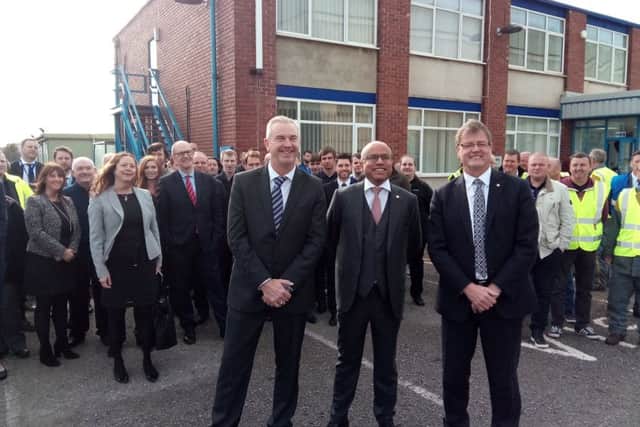 Sanjeev Gupta, centre, with chief executive James Annal, (left) and staff at the Hartlepool Brenda Road mills