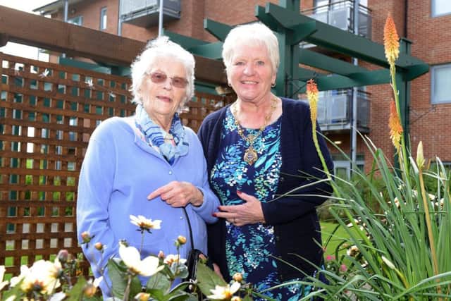 The Mayoress of Hartlepool, Mary Beck, with Hartfields resident June Groom, 85, as they enjoy a look at the flowerbeds in the new patio garden.