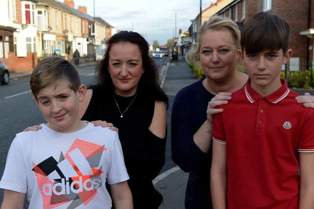Logan Stokes(13) with his mum Charlotte (42) (left) and Archie Pugh (12) with his mum Samantha (42).  Picture by FRANK REID