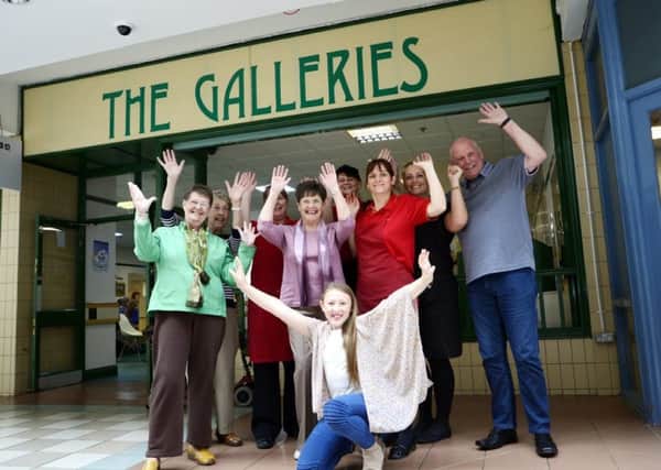 Staff and customers celebrate the anniversary of the popular Galleries restaurant at Middleton Grange shopping centre.