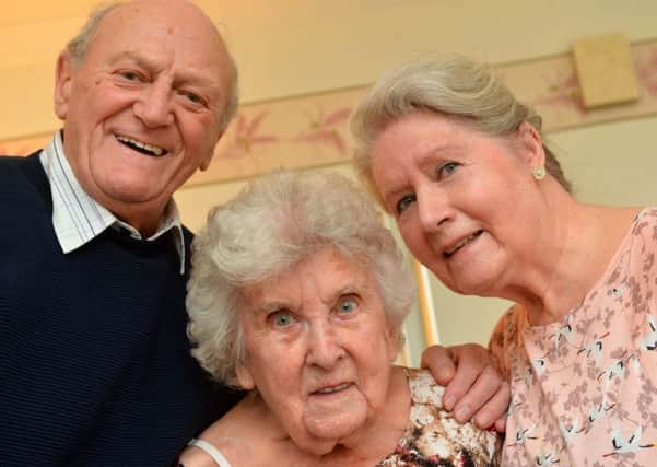 Minnie Nicol celebrates 100th birthday.
Son-in-law Eric Robinson and daughter Dorothy Robinson