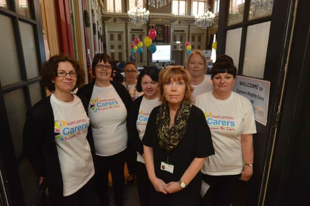 Hartlepool Carers Event for national Carers Rights Day. Middle Hartlepool Carers strategic manager Bev Hart with staff team